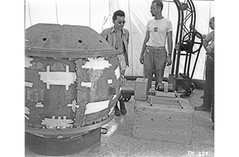 A photo of Louis Slotin at work.